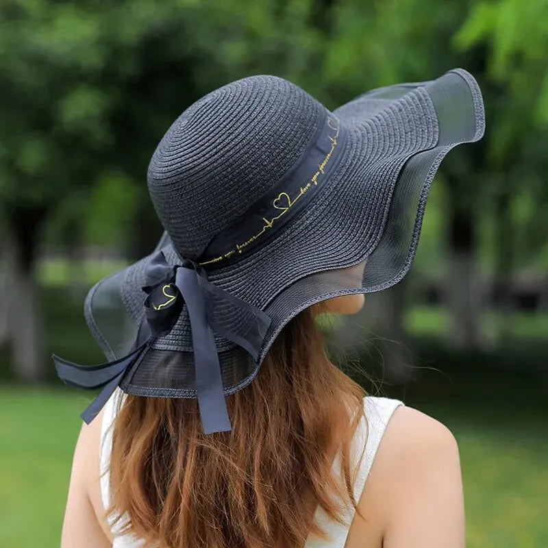 chapeau de soleil noir avec bord en tulle et ruban