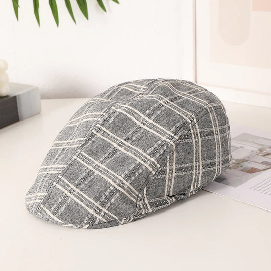 casquette plate grise à carreaux