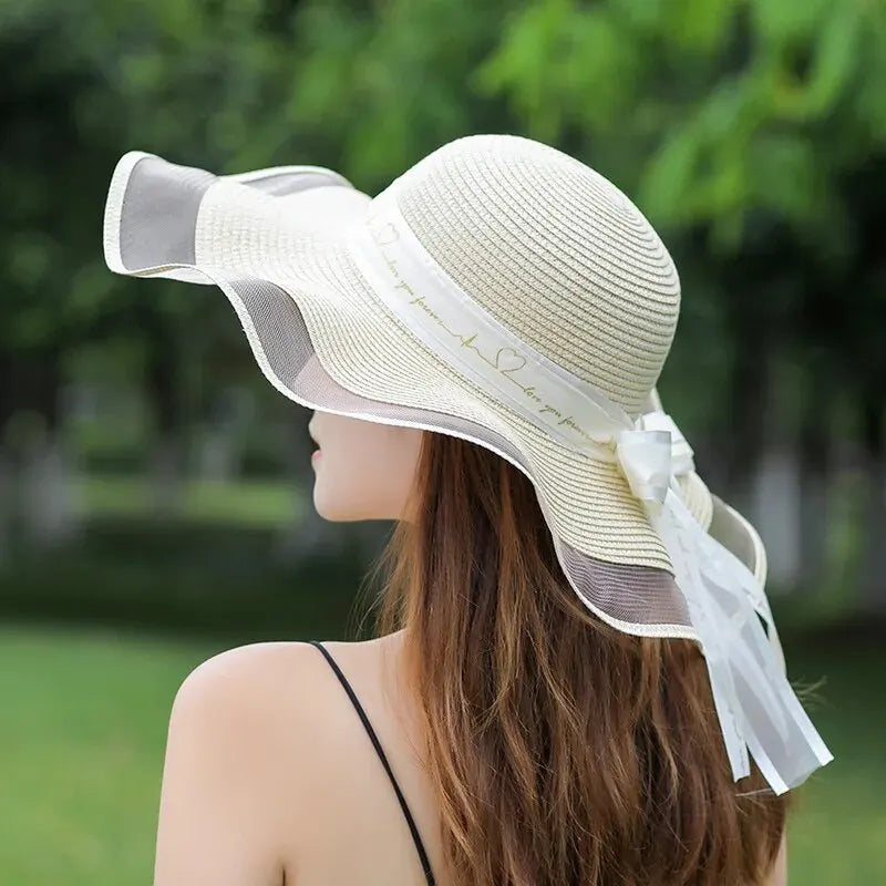 chapeau de soleil crème avec bord en tulle et ruban