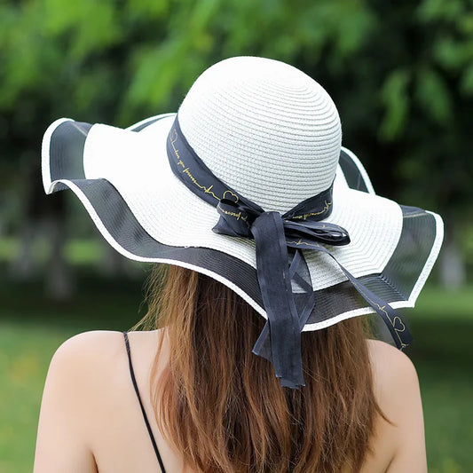 chapeau de soleil blanc avec bord en tulle noir