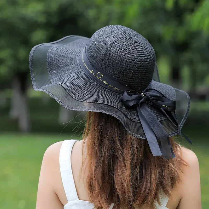 chapeau de soleil noir avec bord en tulle et ruban